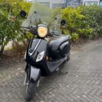 Vooraanzicht van de Sym Fiddle 3 2016 scooter, gereviseerde motor, te koop met garantie