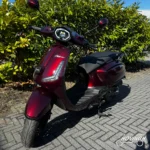 GTS palermo 2025 dieprood — voorkant geel kenteken te koop bij Hovingh Scooters Groningen