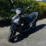 Sym Symhony ST 2019 zwart — voorkant geel kenteken te koop bij Hovingh Scooters Groningen