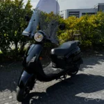 Sym Fiddle 2 2015 zwart — voorkant blauw kenteken te koop bij Hovingh Scooters Groningen