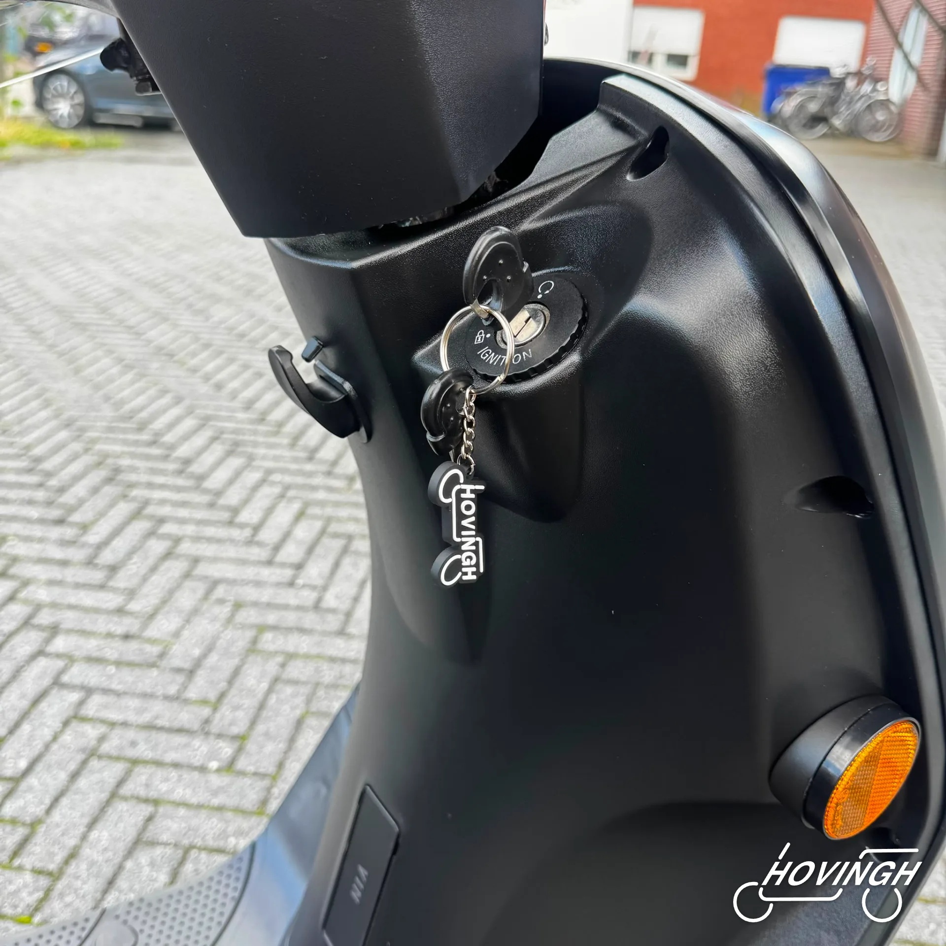 Sym Fiddle2 2021 contactslot en sleutelhanger